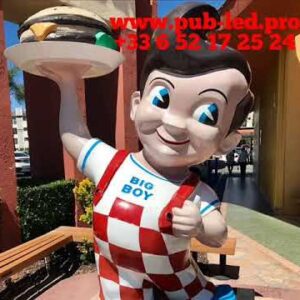 STATUE EN RÉSINE POUR RESTAURANT – GRAND GARÇON PORTANT UN HAMBURGER